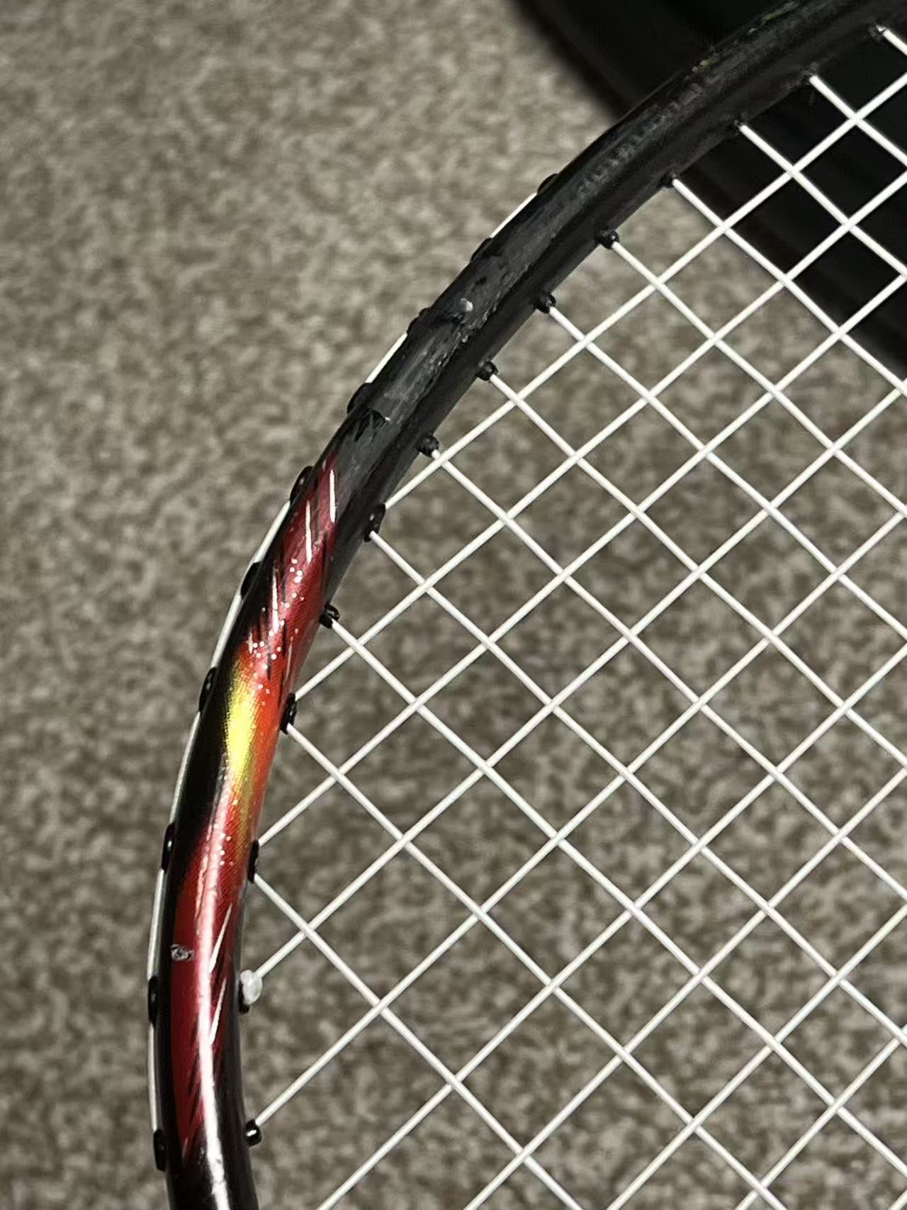 Yonex used Astrox 77 badminton racket strung 4U 26lbs