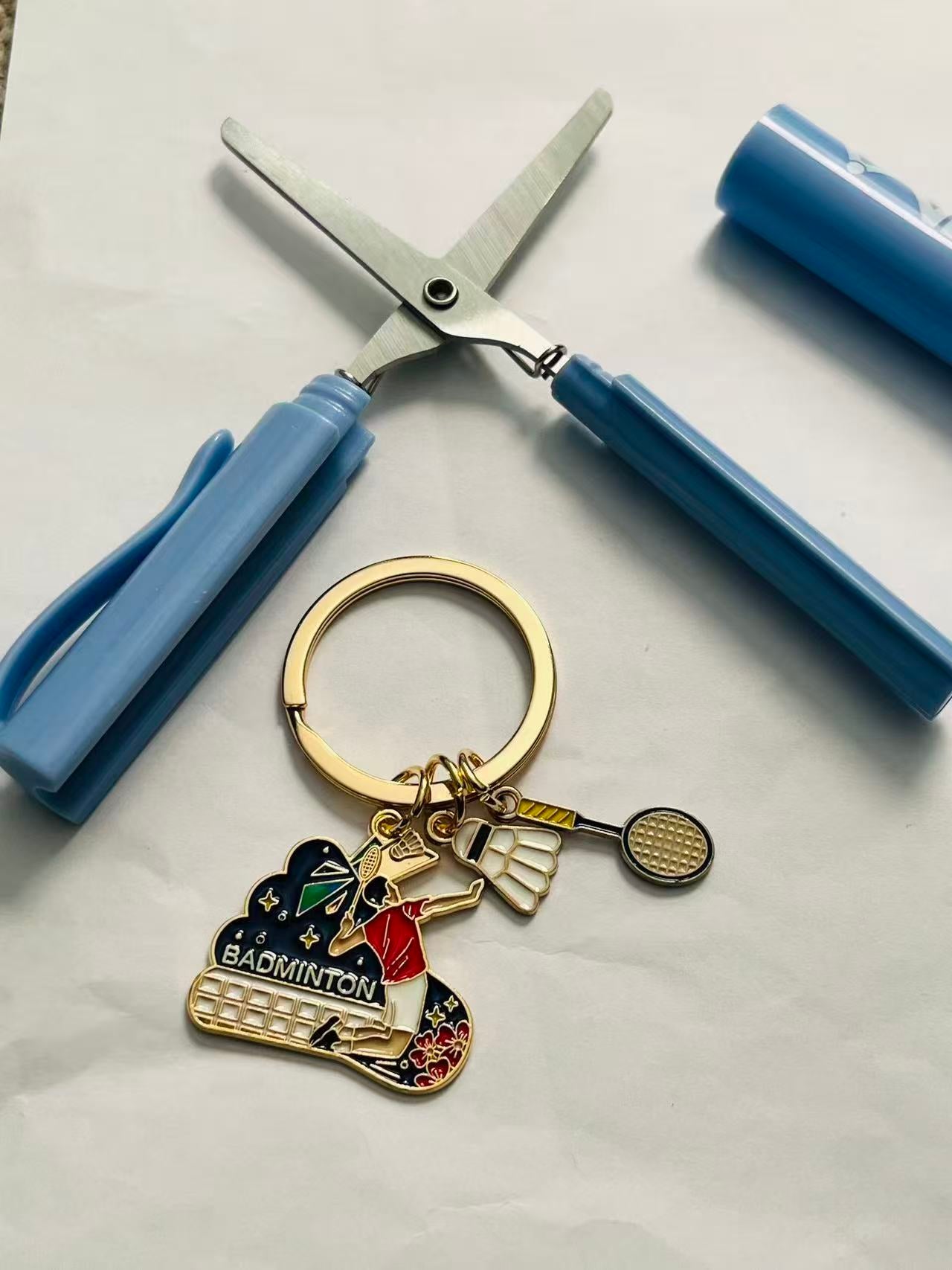One scissor and a keychain