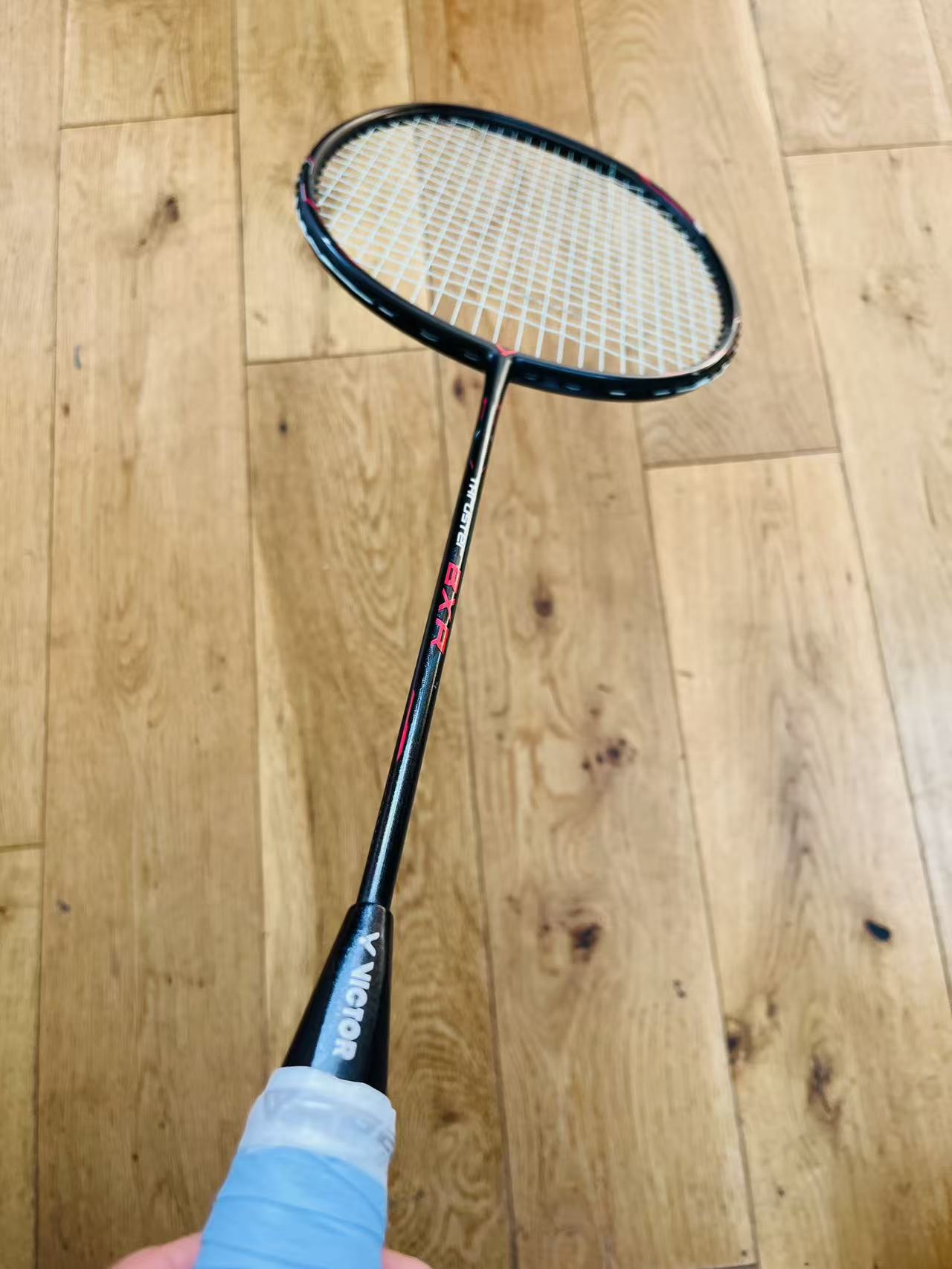 Victor used Thruster BXR badminton racket strung 5U 26lbs