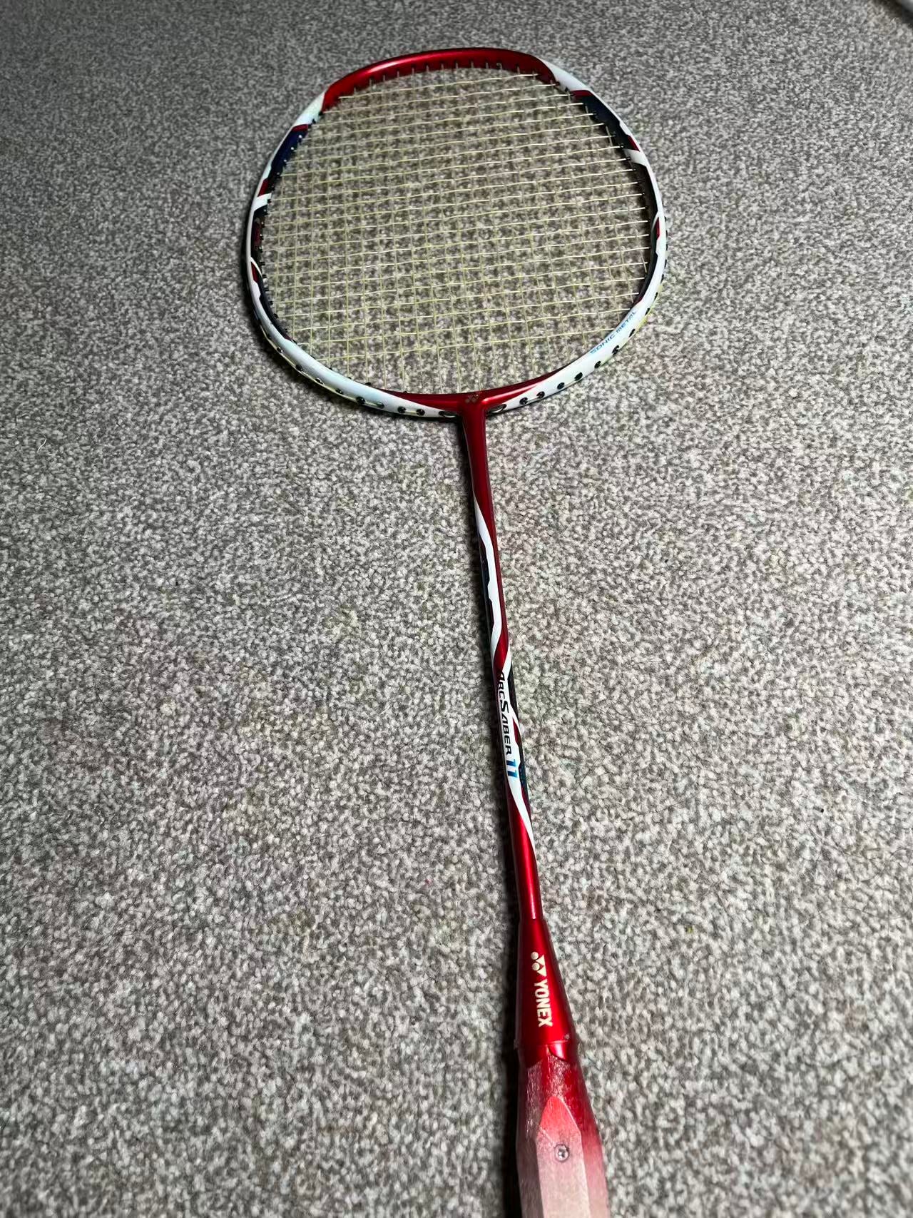Yonex used Arcsaber 11 badminton racket strung 3U 26lbs