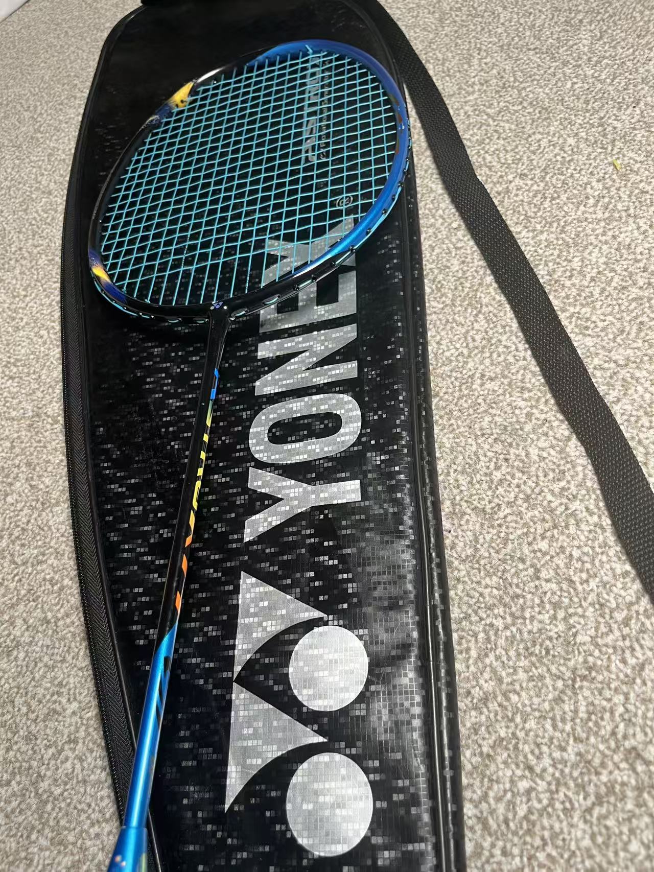 Yonex used Astrox 77 badminton racket strung 4U 26lbs