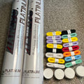 Two buckets of duck feather shuttlecocks + 20 grips