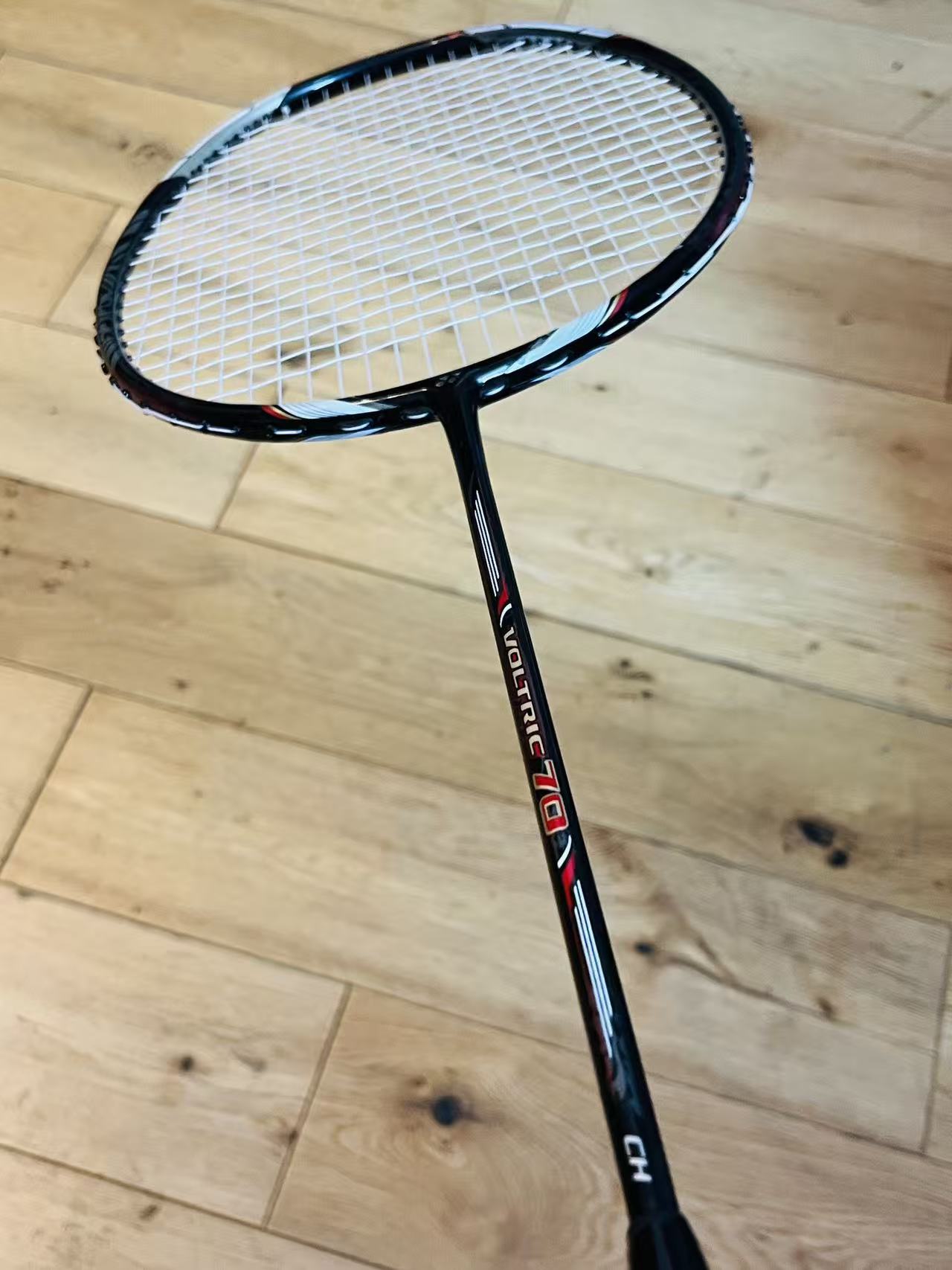 Yonex used Voltric 70 badminton racket strung 26lbs