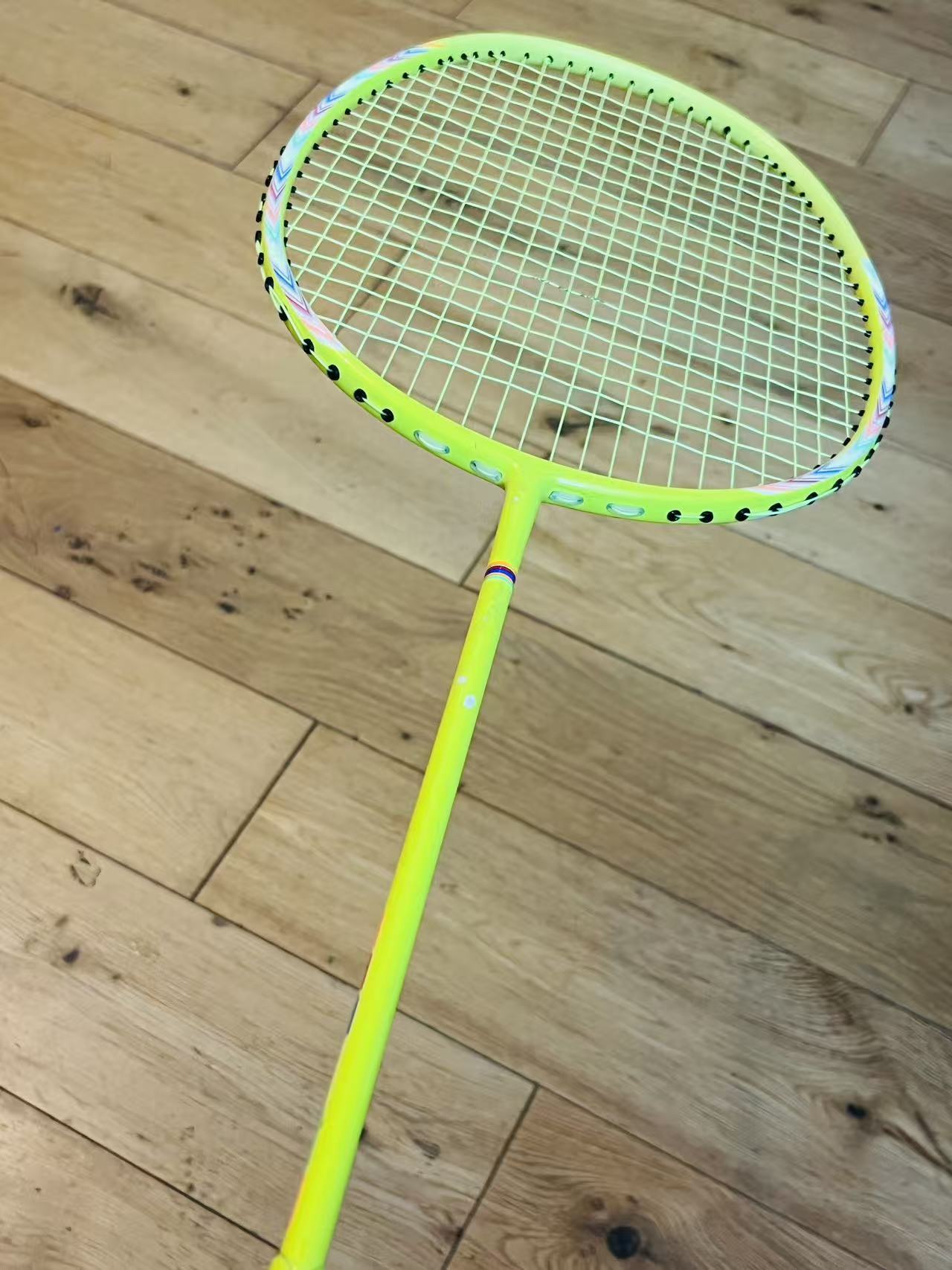 IXE carbon fiber badminton racket strung 23 lbs