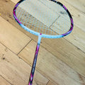 Purple carbon fiber badminton racket strung