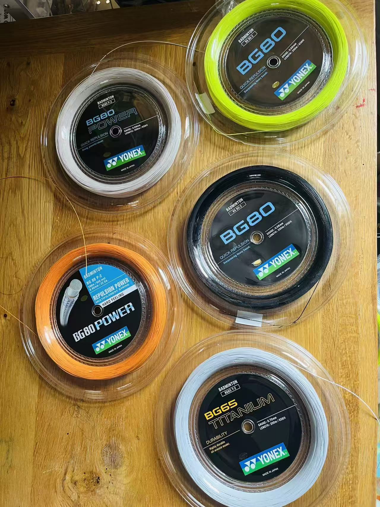 Racket stringing service (including racket strings and stringing service)