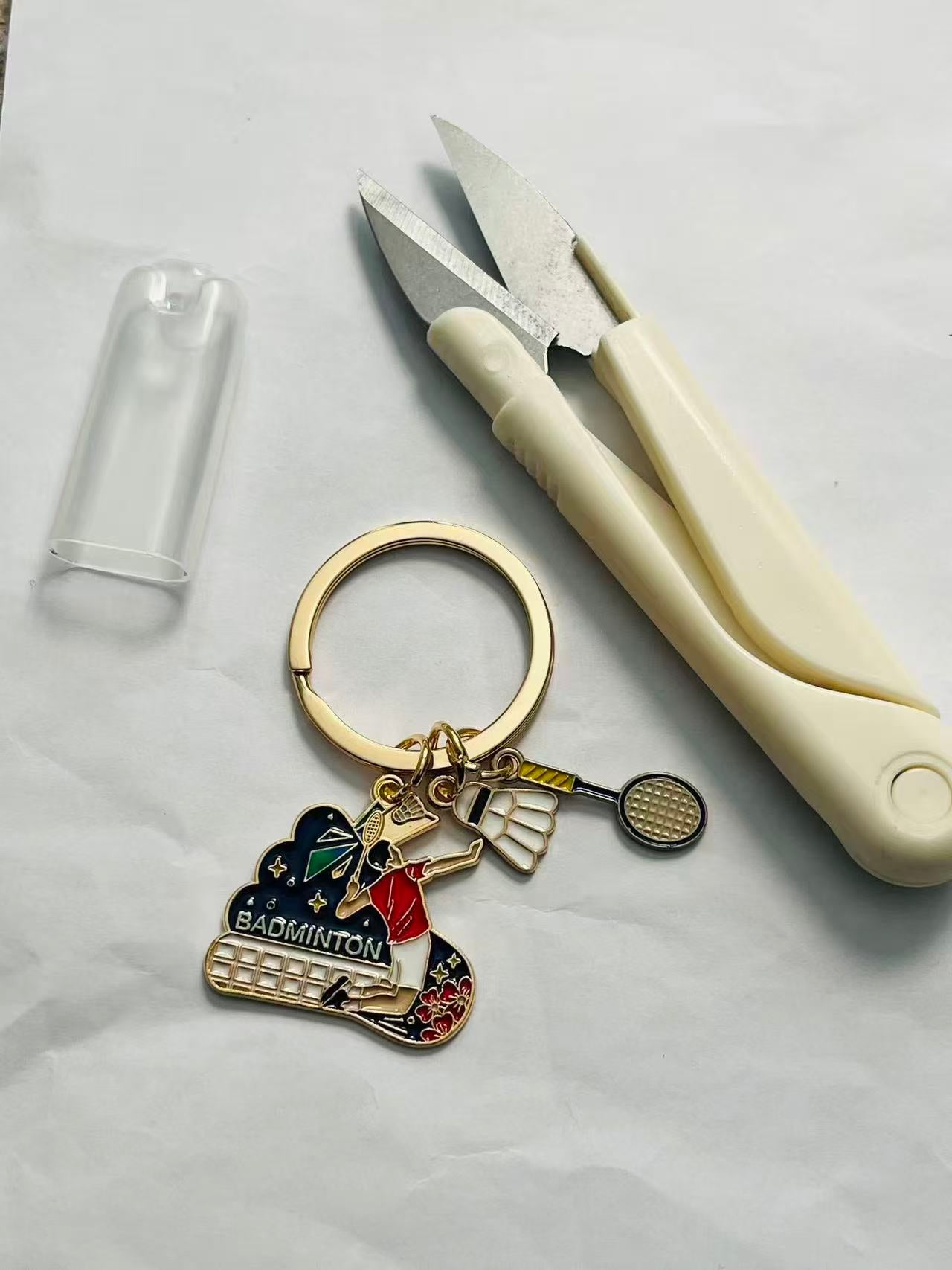 One scissor and a keychain