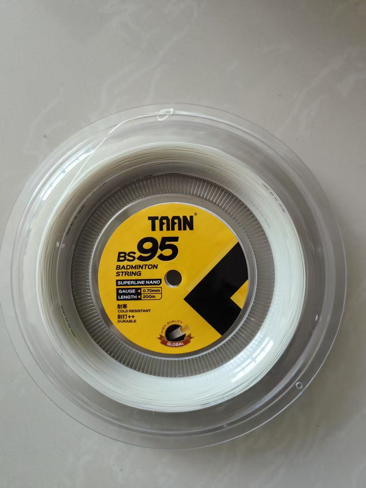 High-performance badminton racket durable 0.70 strings.