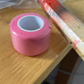 Shock-absorbing thin layer of sponge on badminton racket handle