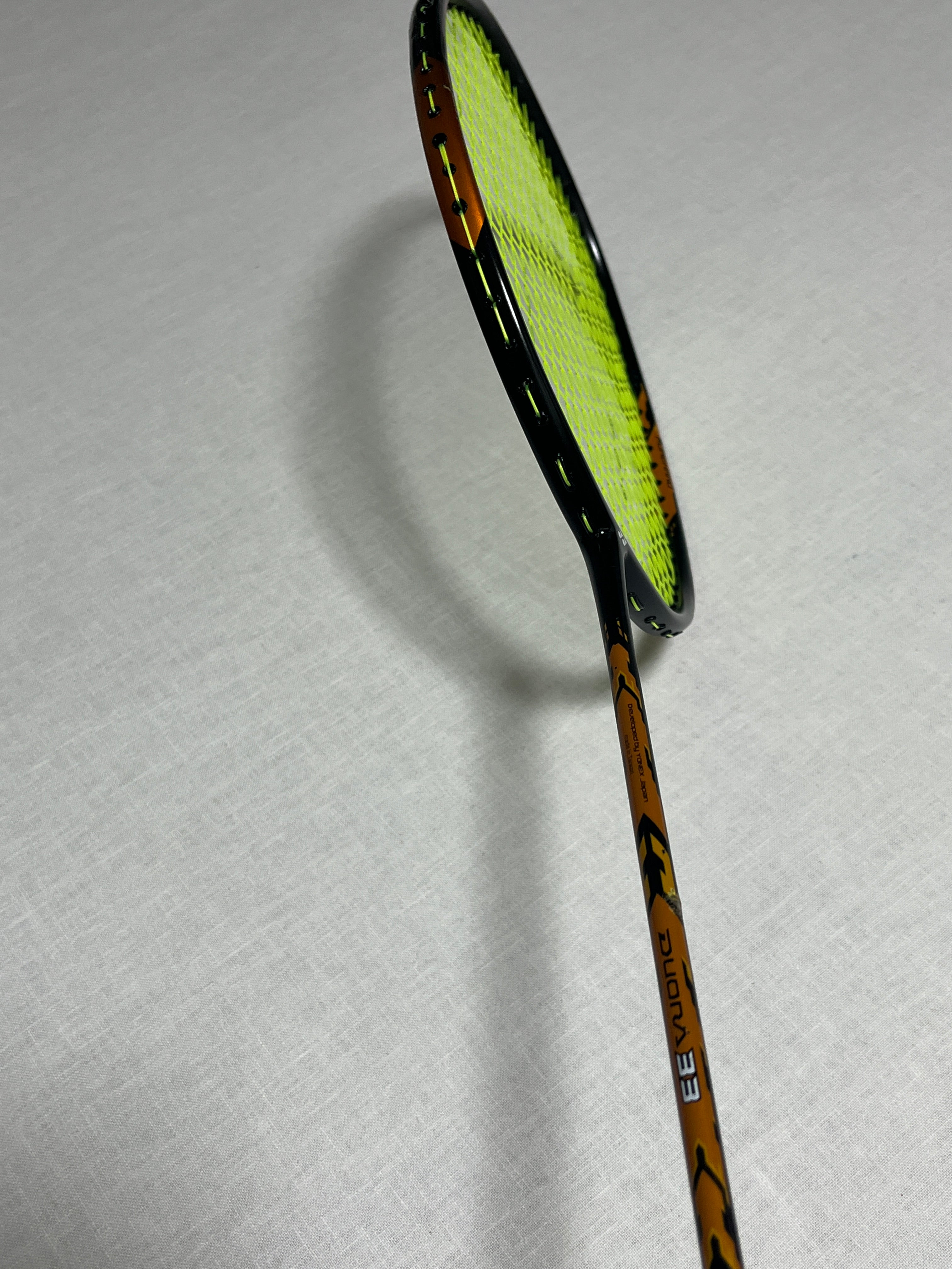 Yonex used Duora 33 badminton racket strung 26lbs 4U